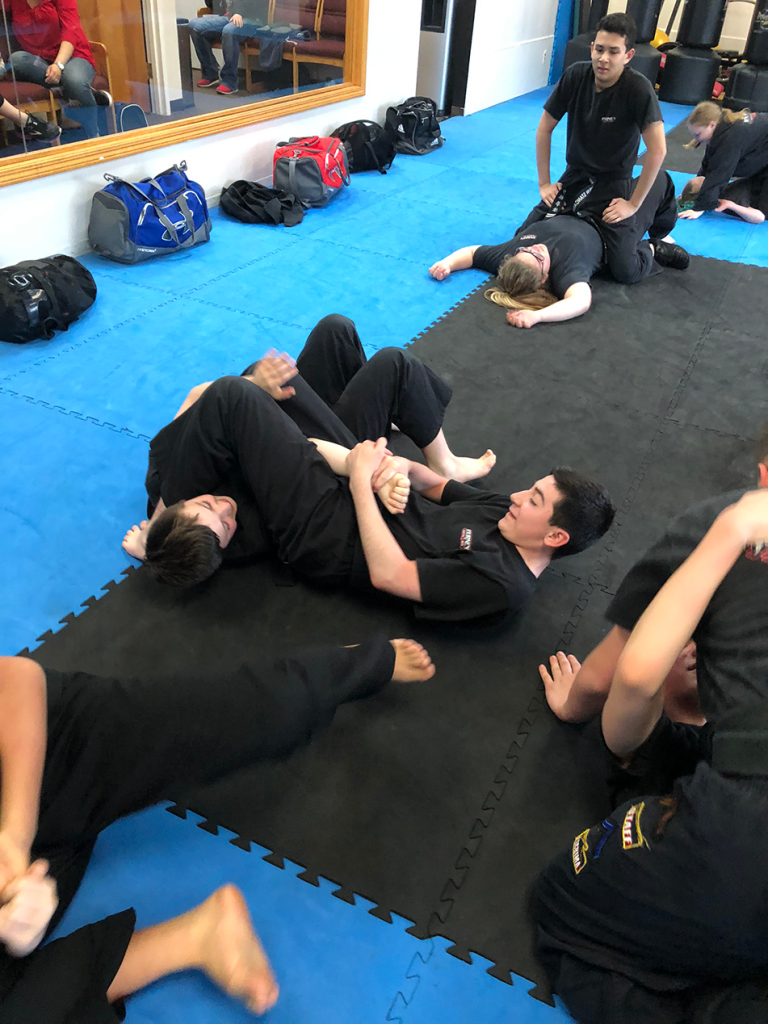 Journey Martial Arts Teen doing an arm bar